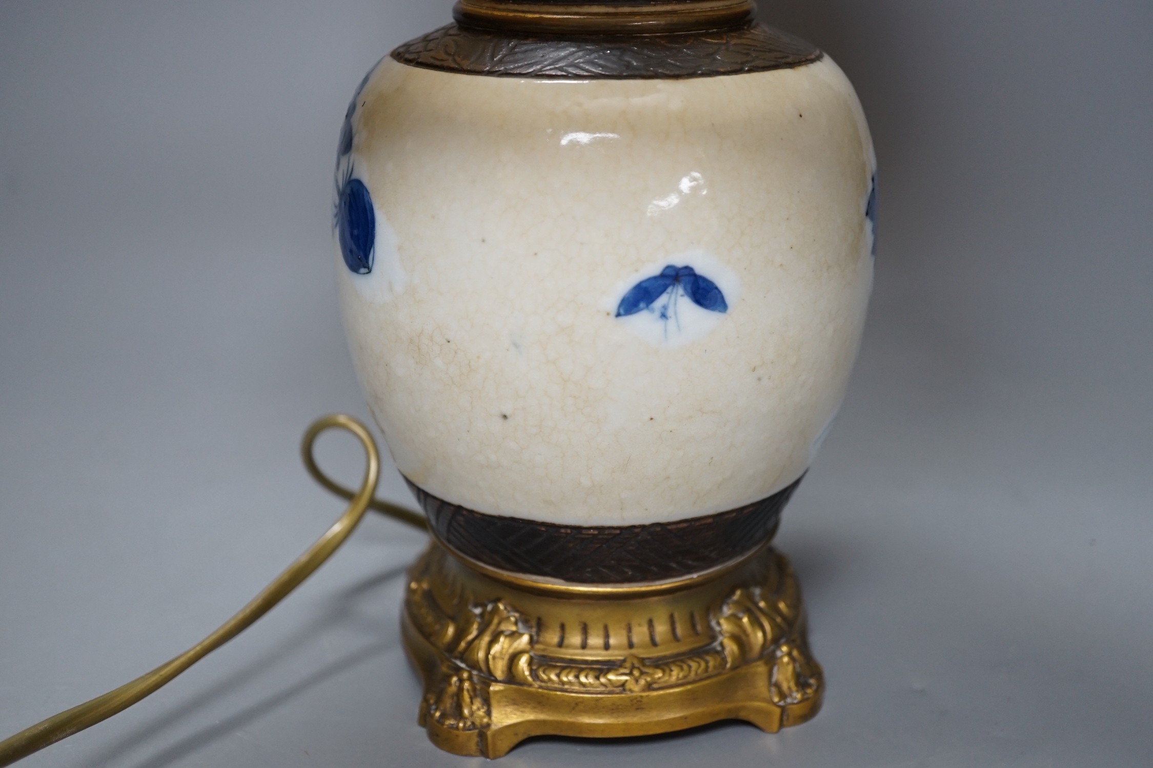 A late 19th century Chinese blue and white crackle glaze jar, now mounted as a lamp, total height 38cm